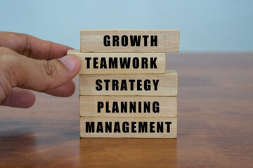TEAMWORK concept with Wooden Blocks.