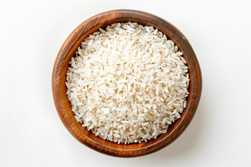 a wooden bowl filled with rice on top of a white table