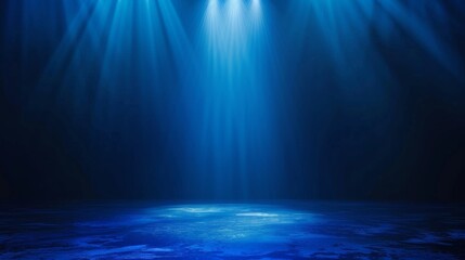 Fototapeta premium Dark blue background with light rays, glowing and shining on the floor, creating an atmospheric effect.