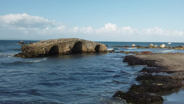 antique stone bridge on the beach of Argassi in Zakynthos