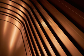 Curved metallic corridor bathed in warm light