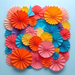 The image features a collection of colorful paper rosettes arranged in a visually pleasing pattern.