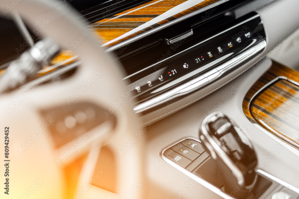 Poster close up of the manual gearbox transmission handle. accelerator handle and buttons in a new car. .