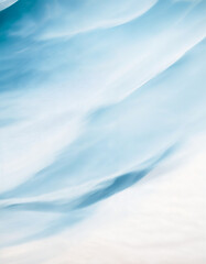 Obraz premium Texture. Watercolor wash of blue turquoise paint, on watercolour paper, blue flow of natural marbled wet paint, abstract background. Very high resolution. Cobalt blue. Backdrop wallpaper. 