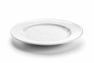 a white plate with a white rim on a white surface