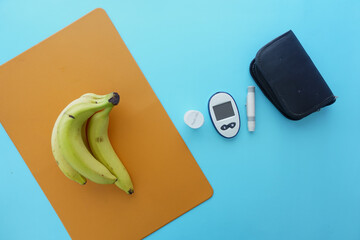 Close up of diabetic measurement tools and pills on color background 