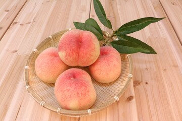 peaches on a wooden table