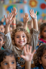 Fototapeta premium A group of happy children sitting in the classroom, raising their hands towards objects.