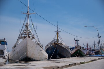 Wooden boats anchor at Paotere Traditional Harbor, Makassar, South Sulawesi, Indonesia