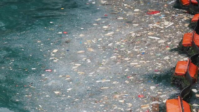 water pollution with garbage on water