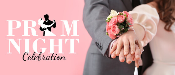 Young woman with corsage and her prom date holding hands on pink background, closeup