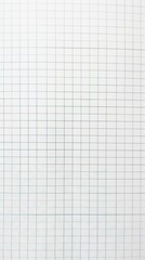 Close-up of a white graph paper sheet with a grid pattern suitable for backgrounds