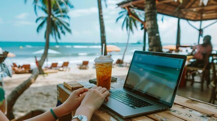 A digital nomad working remotely from a beach cafe, analyzing market trends on their laptop with an iced coffee by their side