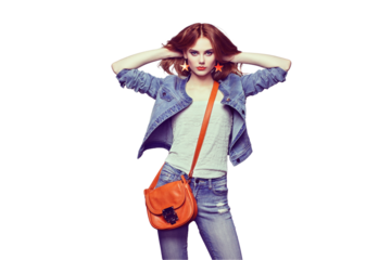 Fashion portrait of beautiful young woman with red hair. Girl in blouse and jeans. Jewelry and hairstyle. Girl with handbag
