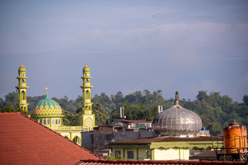 Mosque in the middle of houses village in Bukittinggi, West Sumatera, Indonesia 