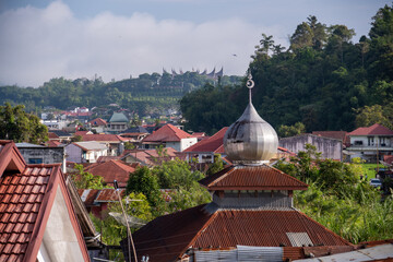 Mosque in the middle of houses village in Bukittinggi, West Sumatera, Indonesia 