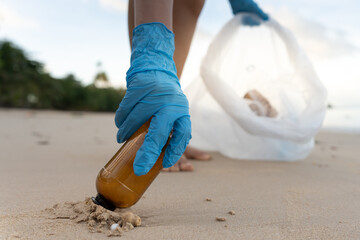 Save ocean. Volunteer pick up trash garbage at the beach and plastic bottles are difficult decompose prevent harm aquatic life. Earth, Environment, Greening planet, reduce global warming, Save world