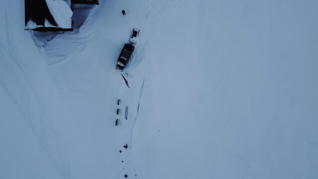 Flyover Norwegian Flag, Snowcat And Snow Covered Surroundings. Norway.