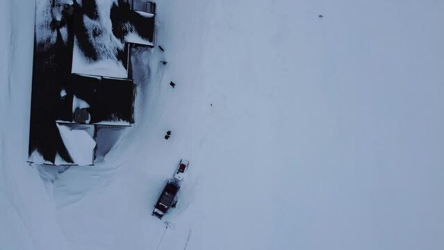 Flyover Smuksjøseter fjellstue. Snowy Hotel In Rondane National Park.