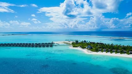 The Tropical aerial view with maldives paradise scenery seascape with water villas as amazing sea...