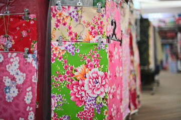 Close-up of peony-patterned Taiwanese floral fabric, one of the most representative patterns....
