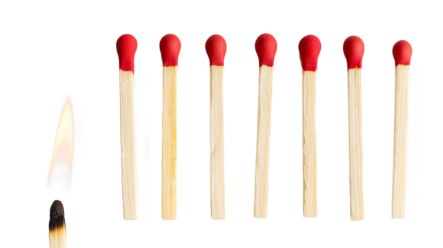 Lit match next to a row of unlit matches isolated on a transparent background