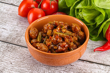 Meatball with vegetables and spices