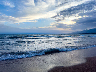 Big waves. stormy sea, thunderclouds. Kyrgyzstan, Lake Issyk-Kul