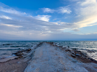 Sunny summer day on the lake. Mountains and sea. Kyrgyzstan, Lake Issyk-Kul