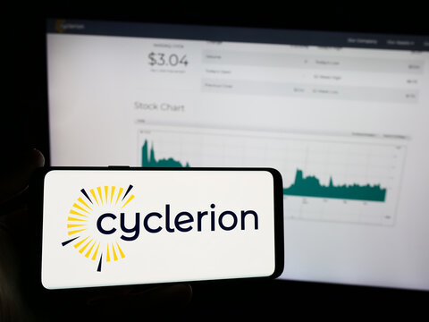 Stuttgart, Germany - 05-02-2024: Person holding mobile phone with logo of US biopharmaceutical company Cyclerion Therapeutics Inc. in front of web page. Focus on phone display.