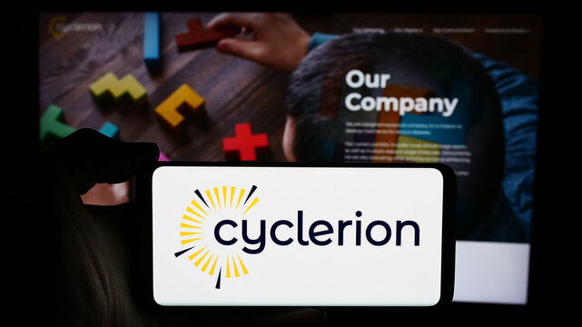 Stuttgart, Germany - 05-02-2024: Person holding cellphone with logo of US biopharmaceutical company Cyclerion Therapeutics Inc. in front of webpage. Focus on phone display.