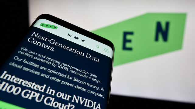 Stuttgart, Germany - 05-02-2024: Smartphone with website of Australian Bitcoin mining company Iris Energy Ltd. (IREN) in front of logo. Focus on top-left of phone display.