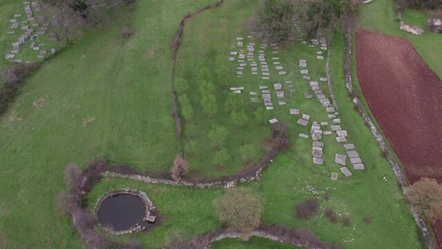 Aerial view of cemetery of old medieval tombstone Stecak