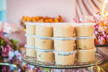 Containers with jellies and peanut butter for a party