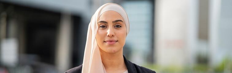 Confident Muslim Businesswoman in Urban Professional Setting
