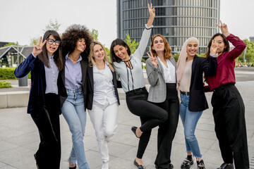 Joyful Diverse Businesswomen Celebrating Success Outdoors
