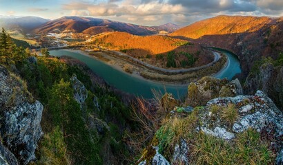 Scenic view of the bend of Vah river and Carpathian mountains panorama. Mala Fatra national park,...