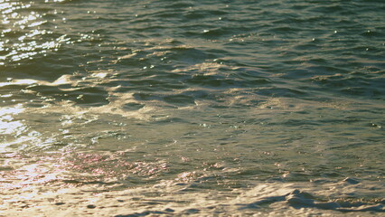 Seascape View. Reflection Of Sunlight Over Sea Surface Texture Background. Slow motion.