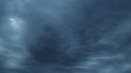 Dark Huge Cloud In Sky. Massive Cumulus Clouds Rolling. Wind Disperses Clouds On A Rainy Day.