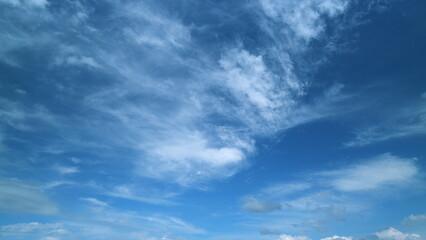 Tropical summer sunlight and sunrays. Colorful cirrus clouds in the sky after heavy rain.