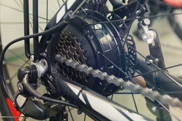 Electric motor and gears on rear e-bike hub close-up