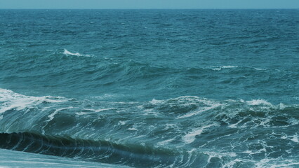 Sea Water Splashing And Spraying On Camera. Powerful Stormy Sea Waves. Marine Storm In Ocean Beach.