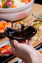 The composition of nigiri sushi with tuna, salmon, shrimp, butterfish on rice