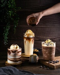 Set of black ice coffee and ice latte coffee with milk in tall glass isolated on white background.