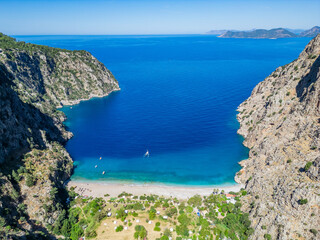 The most beautiful beach in the world and in Turkey is the Butterfly Valley on the Lycian Way in Fethiye. The sea is turquoise and the sand is unique. It can only be reached by boat. There are over 80