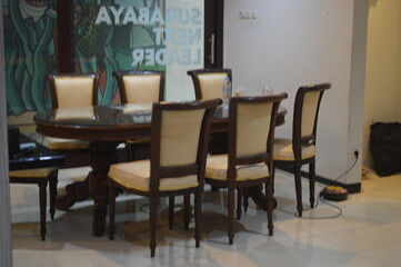 Luxurious home chairs with magnificent interiors are neatly arranged in the living room