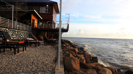 Cafe tables on the beach in the afternoon, a great place to relax