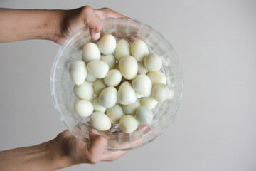 A bowl full of small eggs