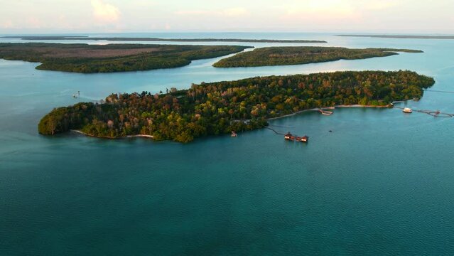 Stunning aerial seascape with turquoise water and mangrove trees at sunrise at Leebong Island in Belitung Indonesia