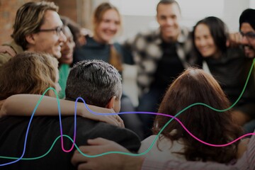 Community team doing a group hug